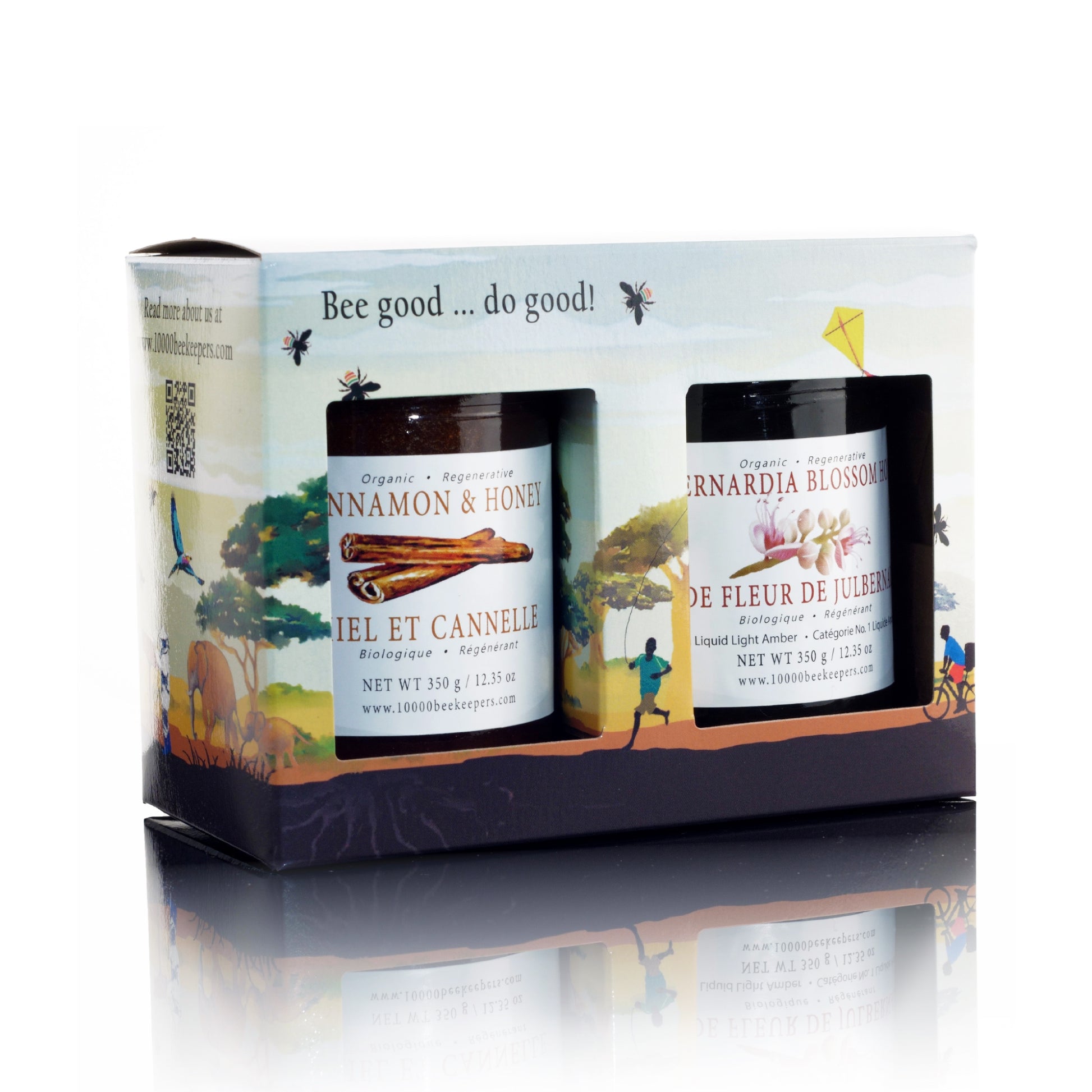A gift set of two large jars of premium raw honey varieties, packaged for gifting